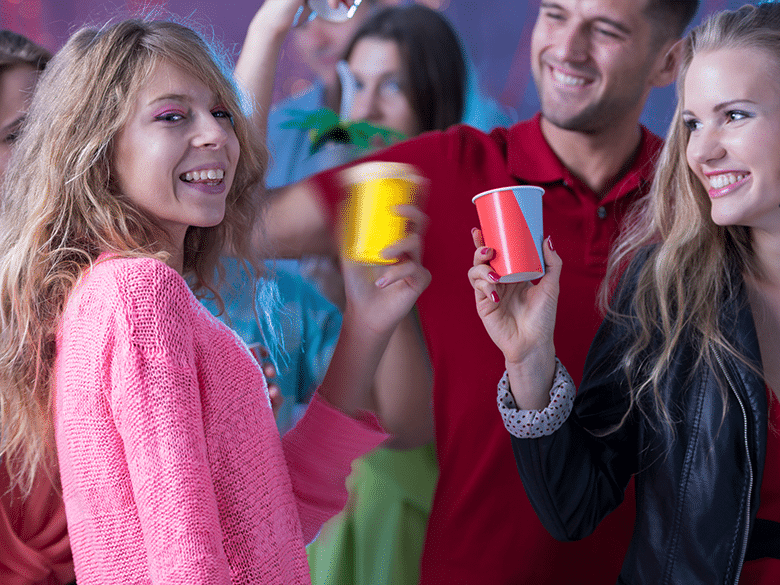 Teenagers drinking at a party